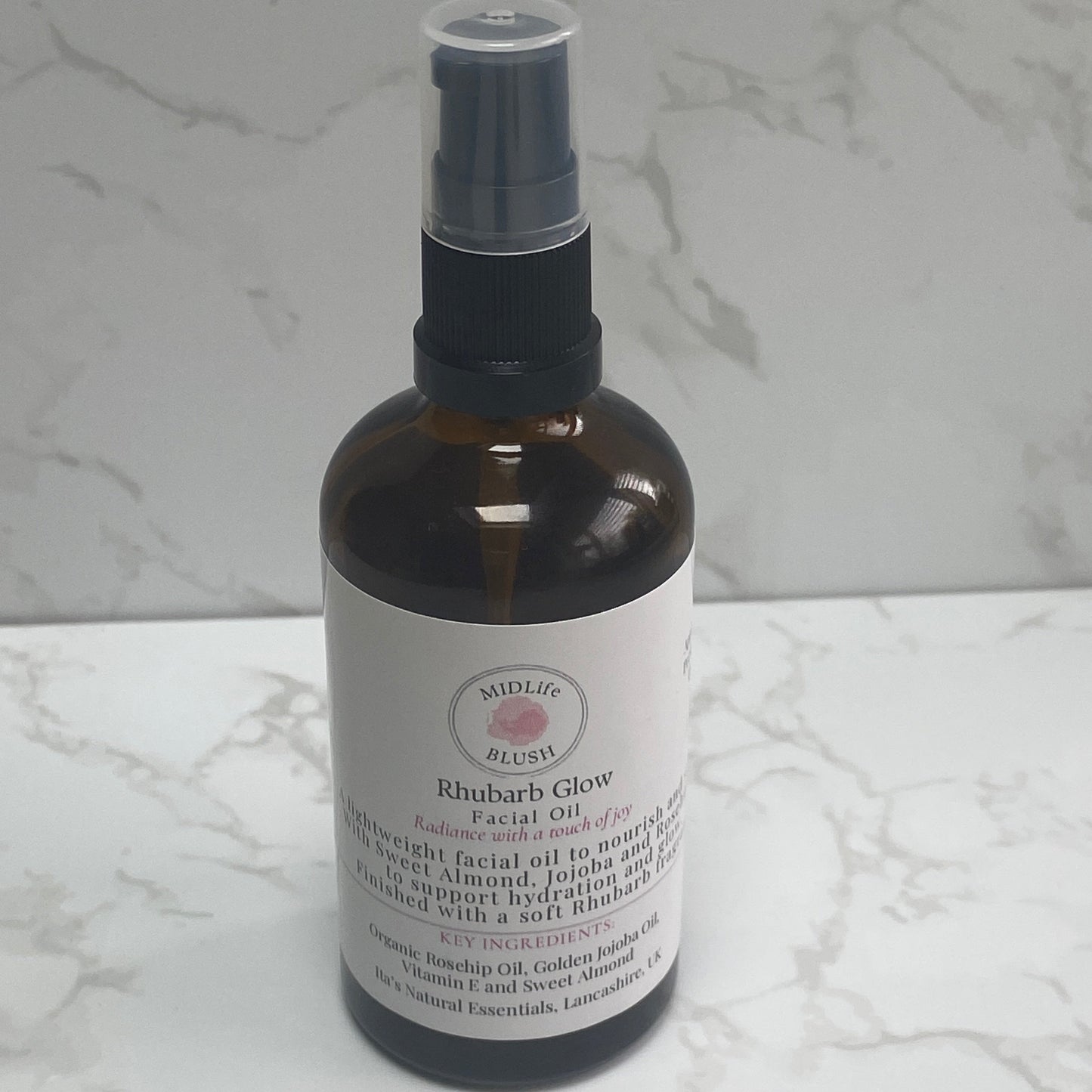 Bottle of moisture locking face and body oil