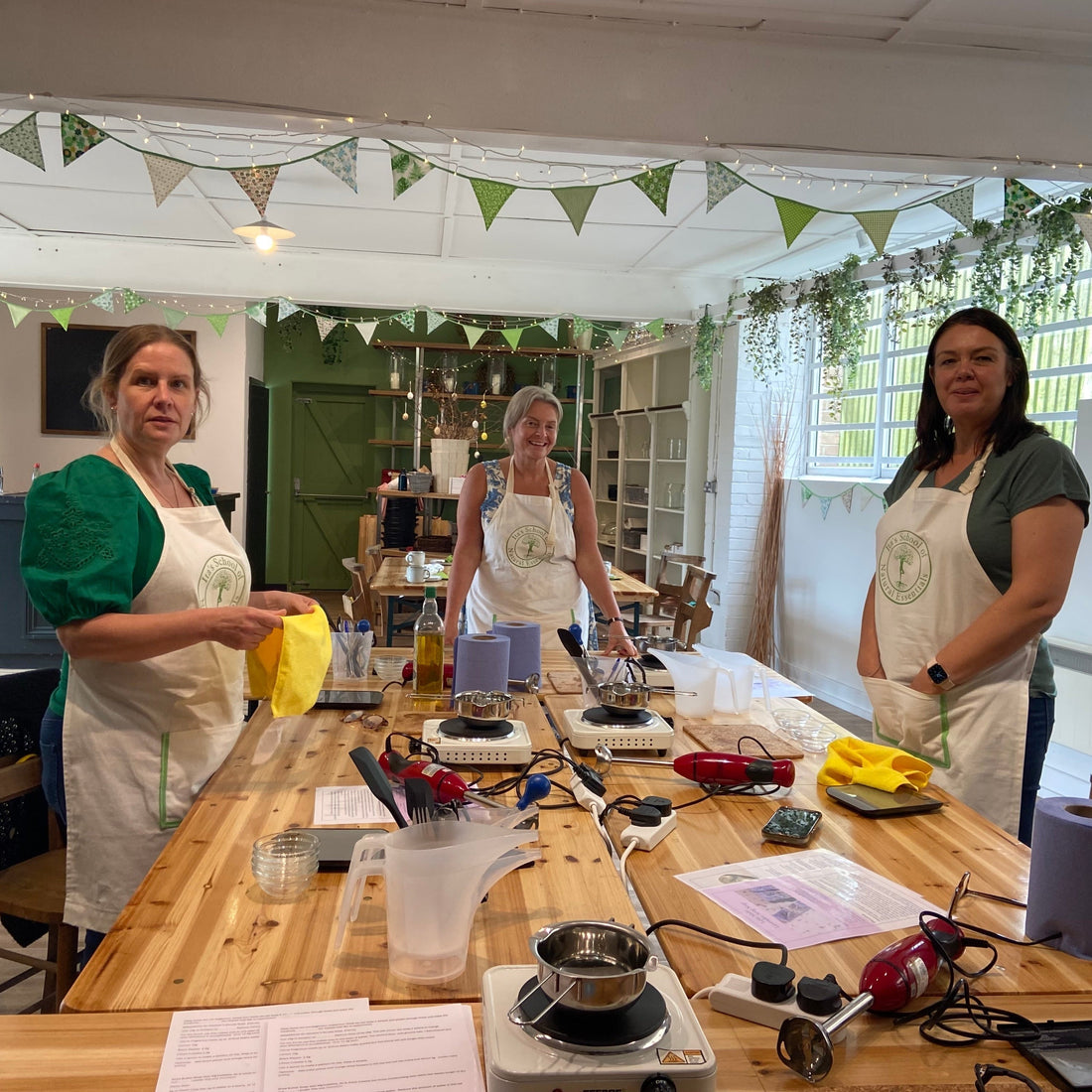 Ladies around a workshop learning to make cold process natural soaps