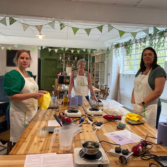 Ladies around a workshop learning to make cold process natural soaps