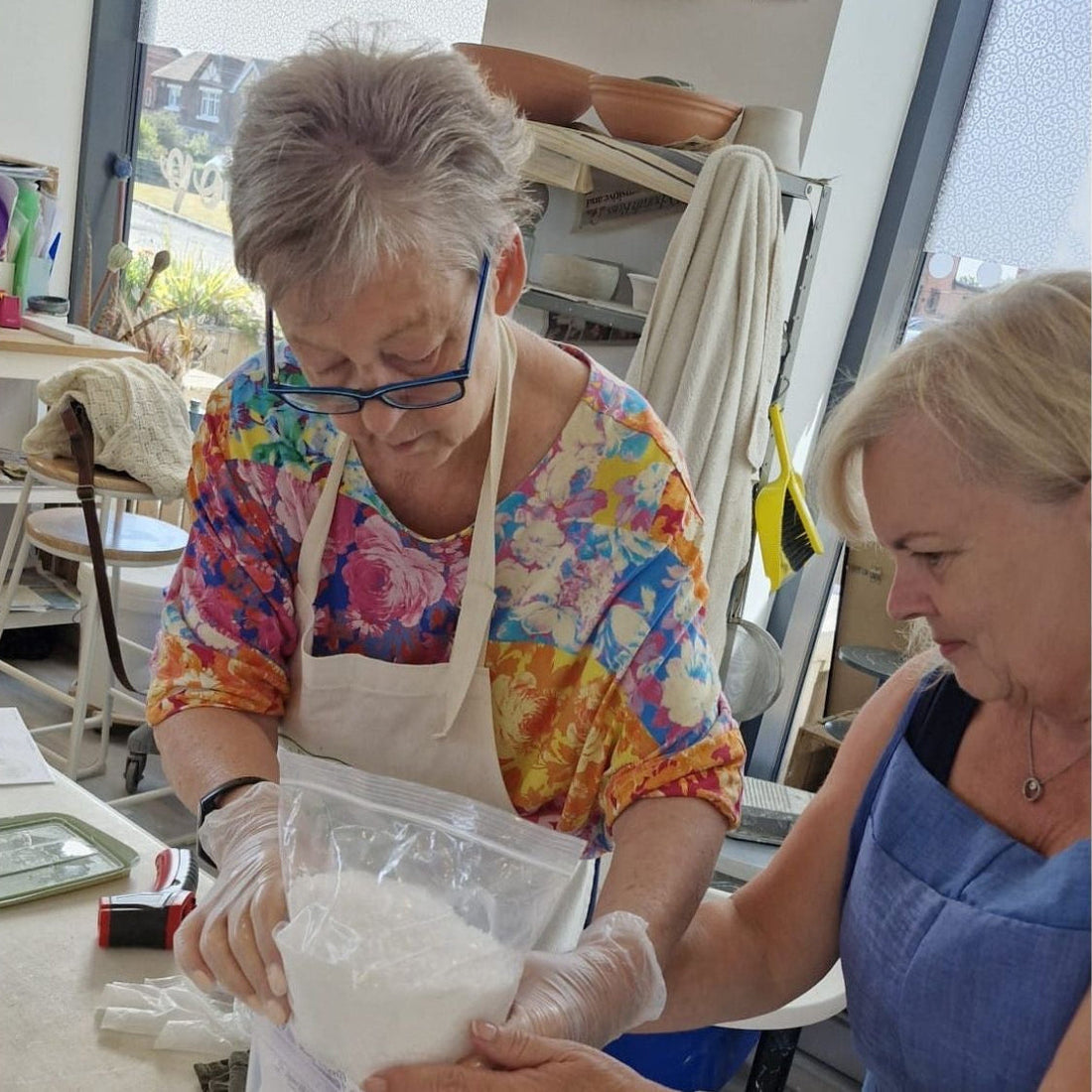 Ladies enjoying creating skin care together in a beautiful workshop. Women creating and taking time out for themselves 