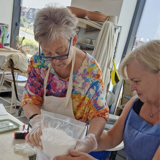 Ladies enjoying creating skin care together in a beautiful workshop. Women creating and taking time out for themselves 