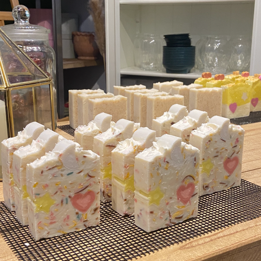 Handmade confetti soap bar with colourful embeds and heart design, created at a soap making workshop in Tarleton, Lancashire