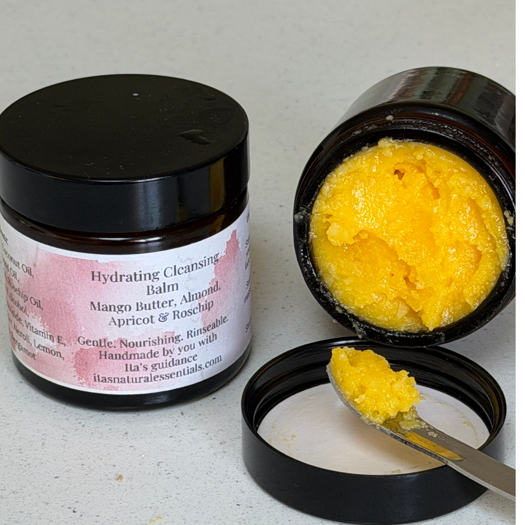 A Mango Butter, Almond, Apricot and Rosehip Cleansing Balm. Beautiful deep golden balm